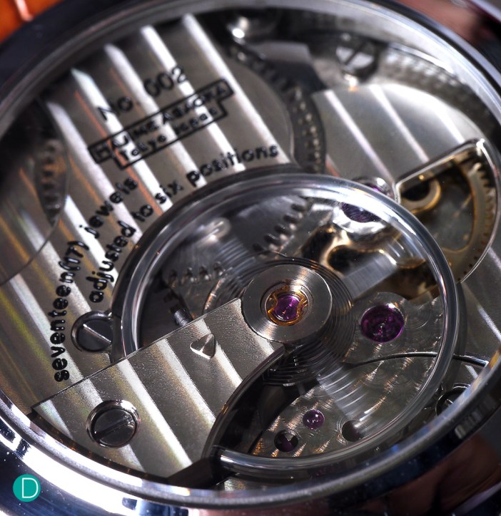 The movement of the Hajime Asaoka Project Tsunami. The huge balance wheel, some 16mm in diameter occupies more than half the real estate of the movement.